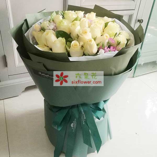 送西双版纳傣族自治州景洪市勐罕镇农贸市场…的鲜花实拍图