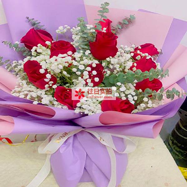 送莒县第二实验小学对过御龙华亭小区的鲜花实拍图