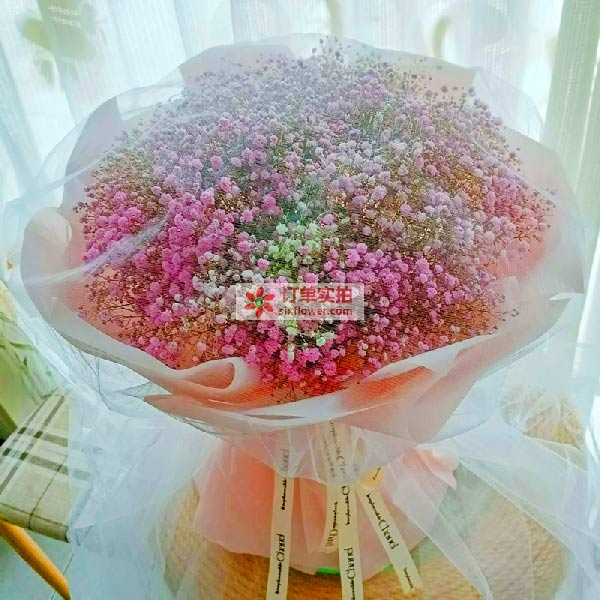 送微山县东风路百亮眼睛店的鲜花实拍图