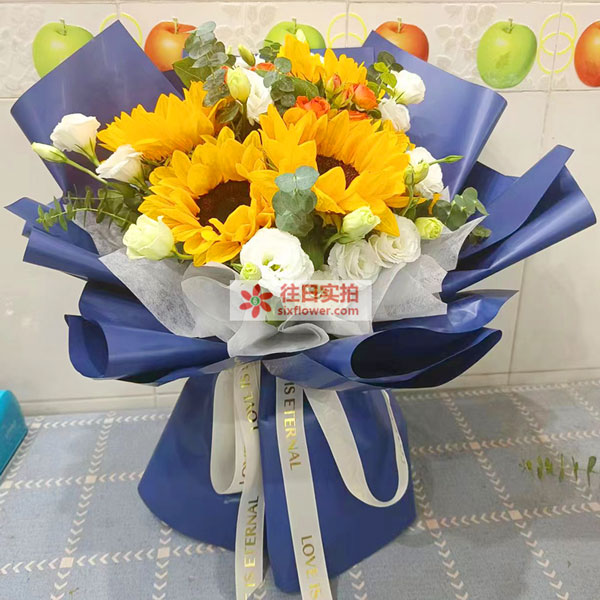 送宁明县林业局大楼一楼的鲜花实拍图